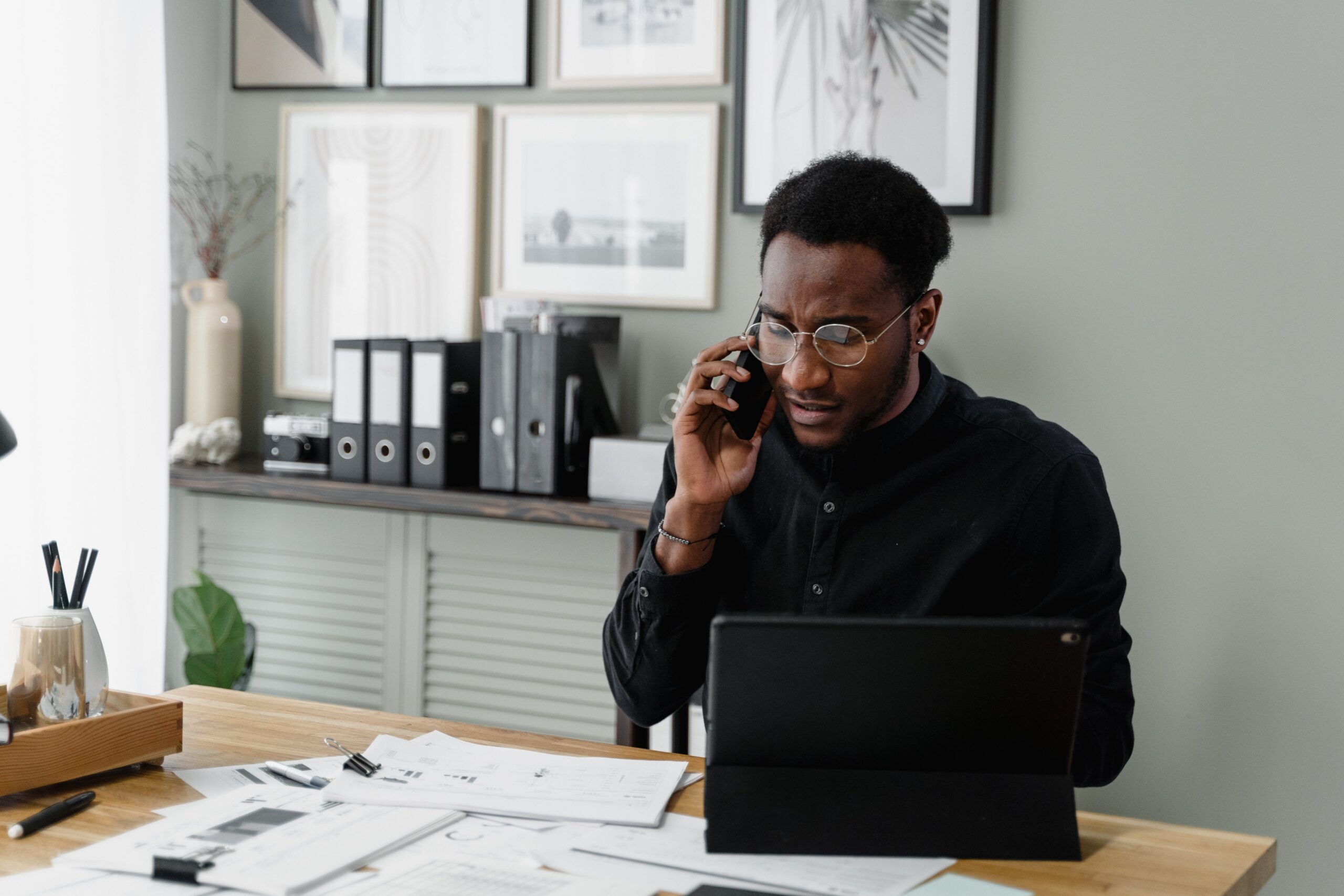 person doing payroll at table